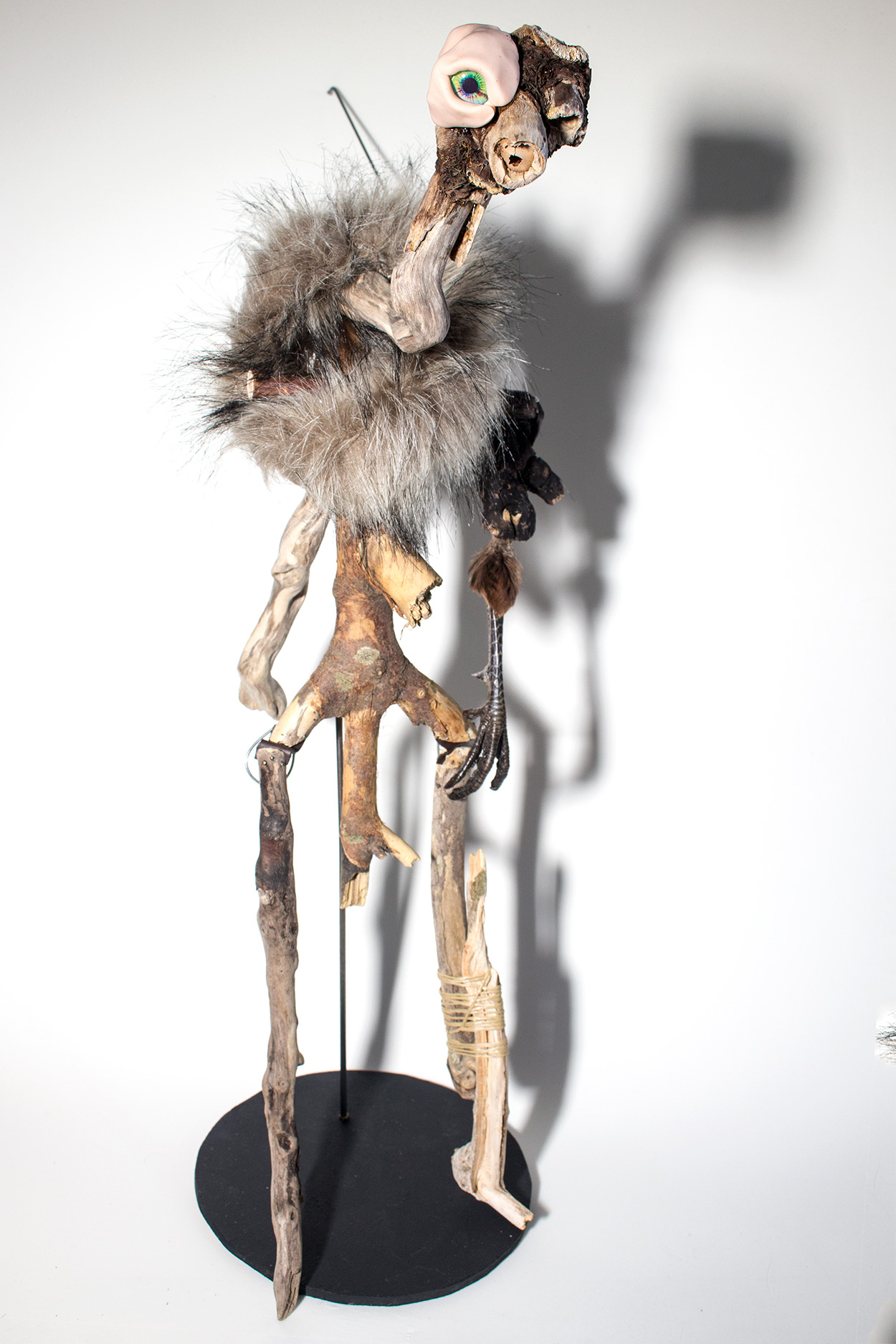 An artist's puppet made from driftwood and taxidermy